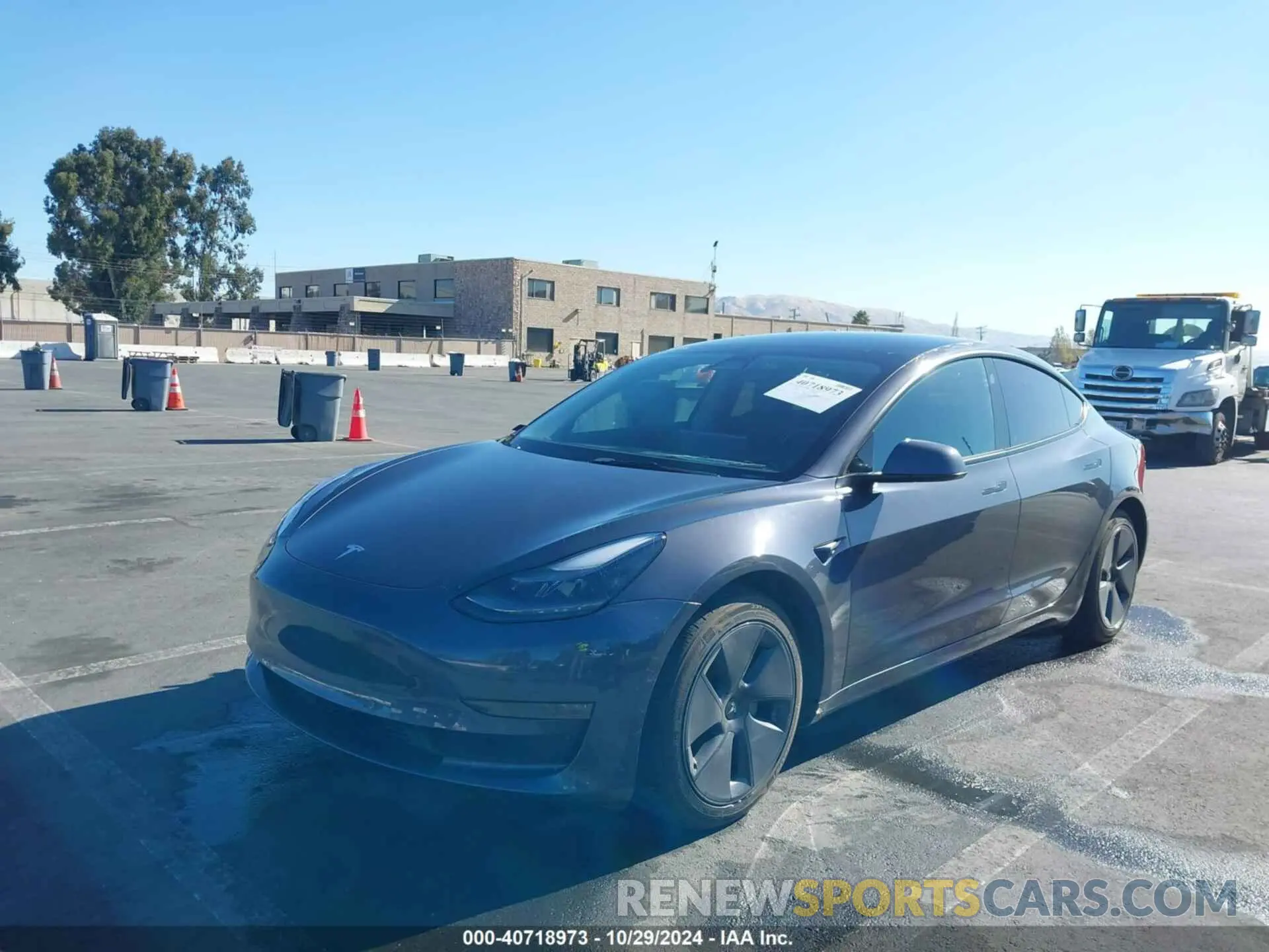 2 fotografías del automóvil dañado 5YJ3E1EB4NF171860 TESLA MODEL 3 2022