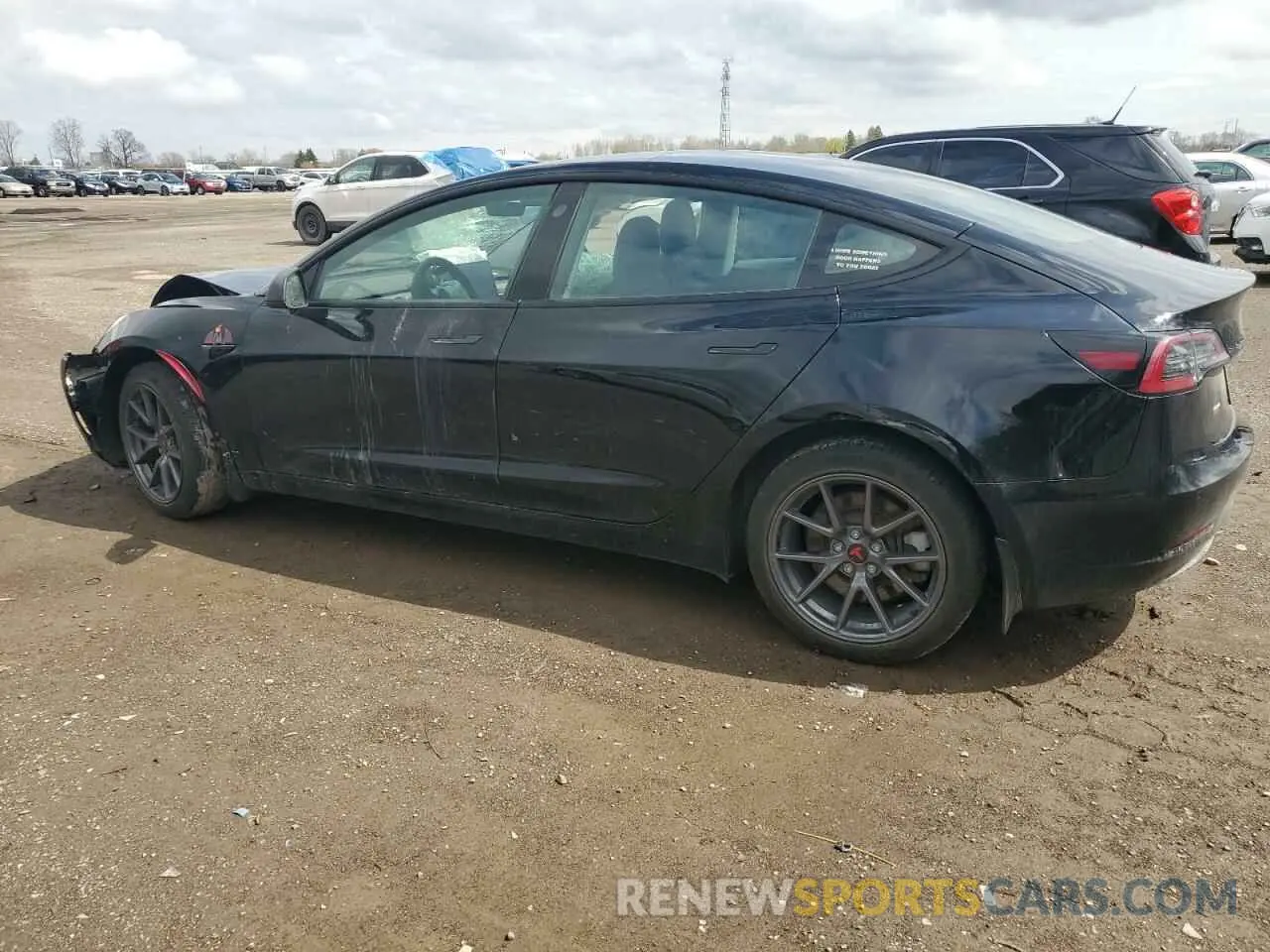 2 fotografías del automóvil dañado 5YJ3E1EB4NF179697 TESLA MODEL 3 2022