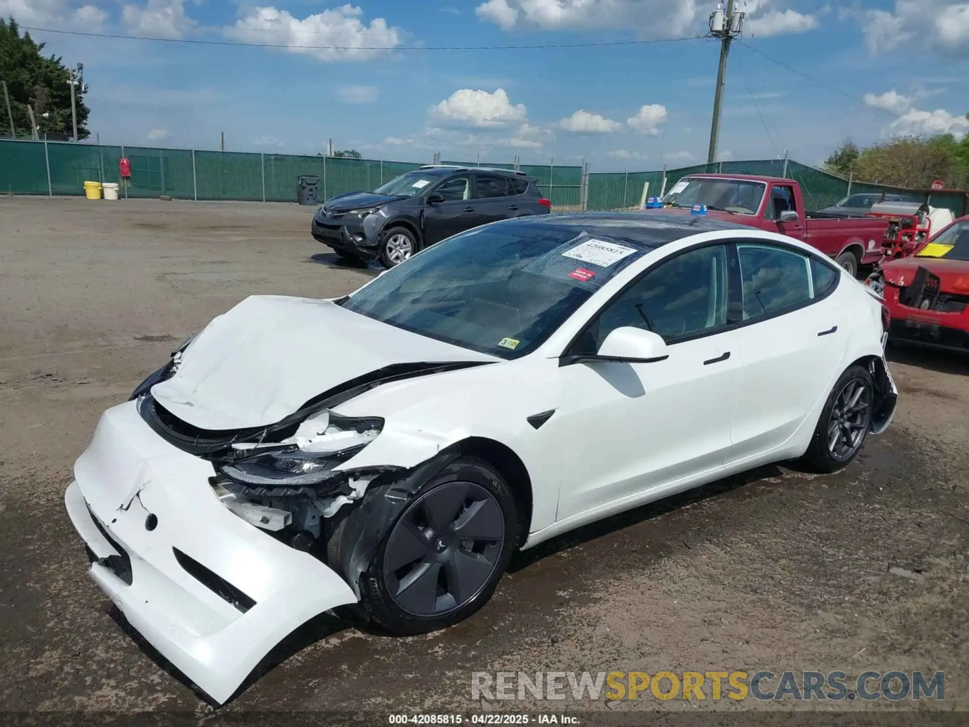 2 fotografías del automóvil dañado 5YJ3E1EB4NF183832 TESLA MODEL 3 2022