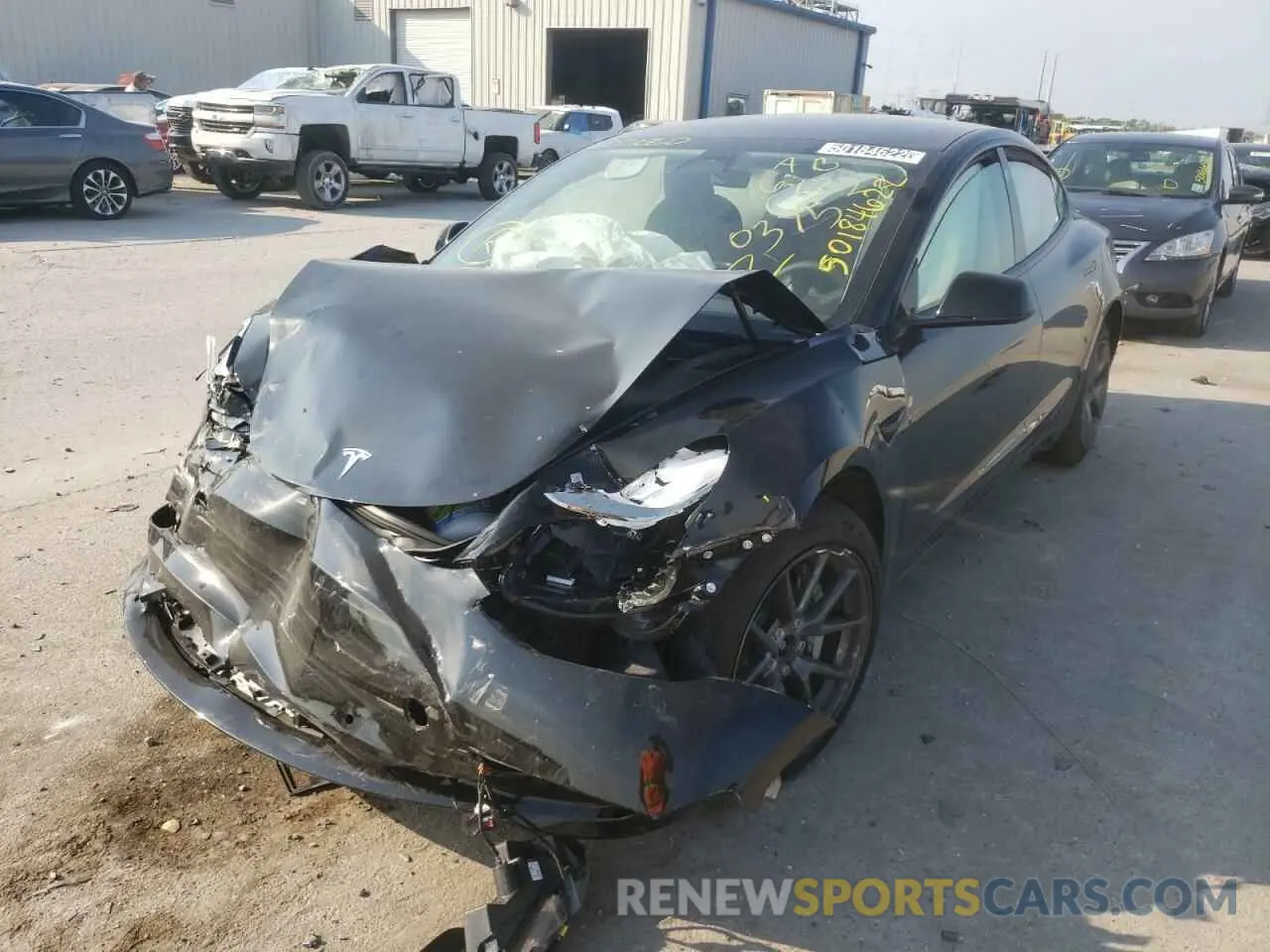 2 fotografías del automóvil dañado 5YJ3E1EB4NF190375 TESLA MODEL 3 2022