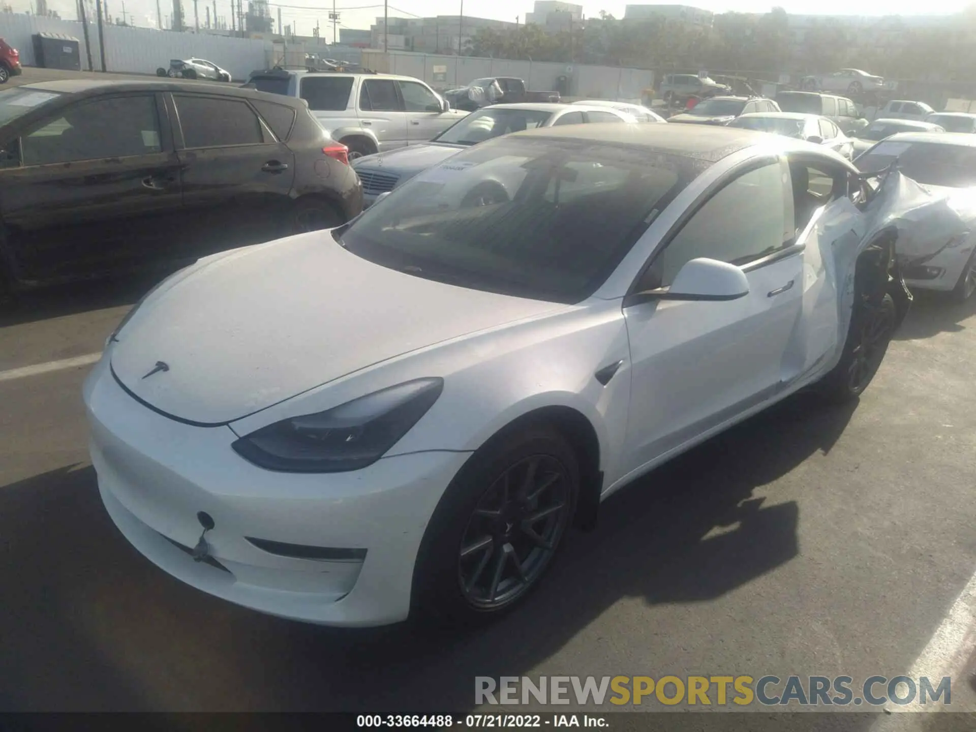 2 fotografías del automóvil dañado 5YJ3E1EB4NF196516 TESLA MODEL 3 2022