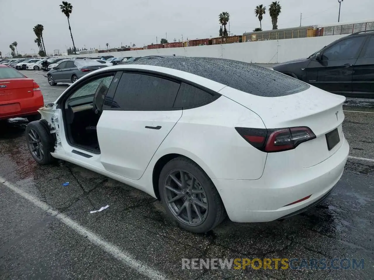 2 fotografías del automóvil dañado 5YJ3E1EB4NF212763 TESLA MODEL 3 2022