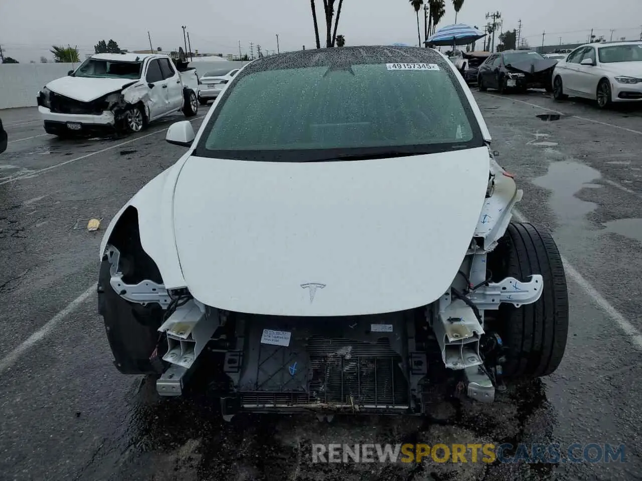 5 fotografías del automóvil dañado 5YJ3E1EB4NF212763 TESLA MODEL 3 2022