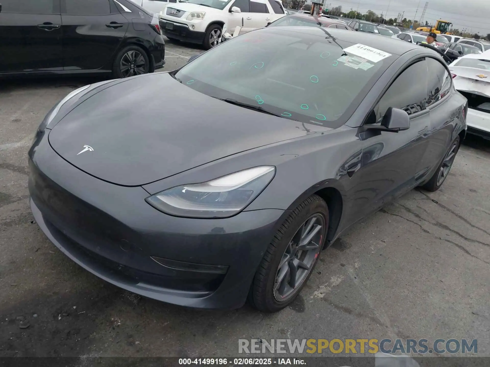 2 fotografías del automóvil dañado 5YJ3E1EB4NF255905 TESLA MODEL 3 2022