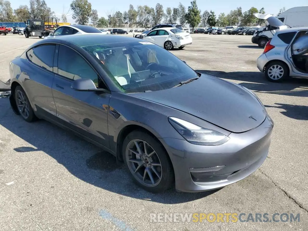 4 fotografías del automóvil dañado 5YJ3E1EB4NF276804 TESLA MODEL 3 2022