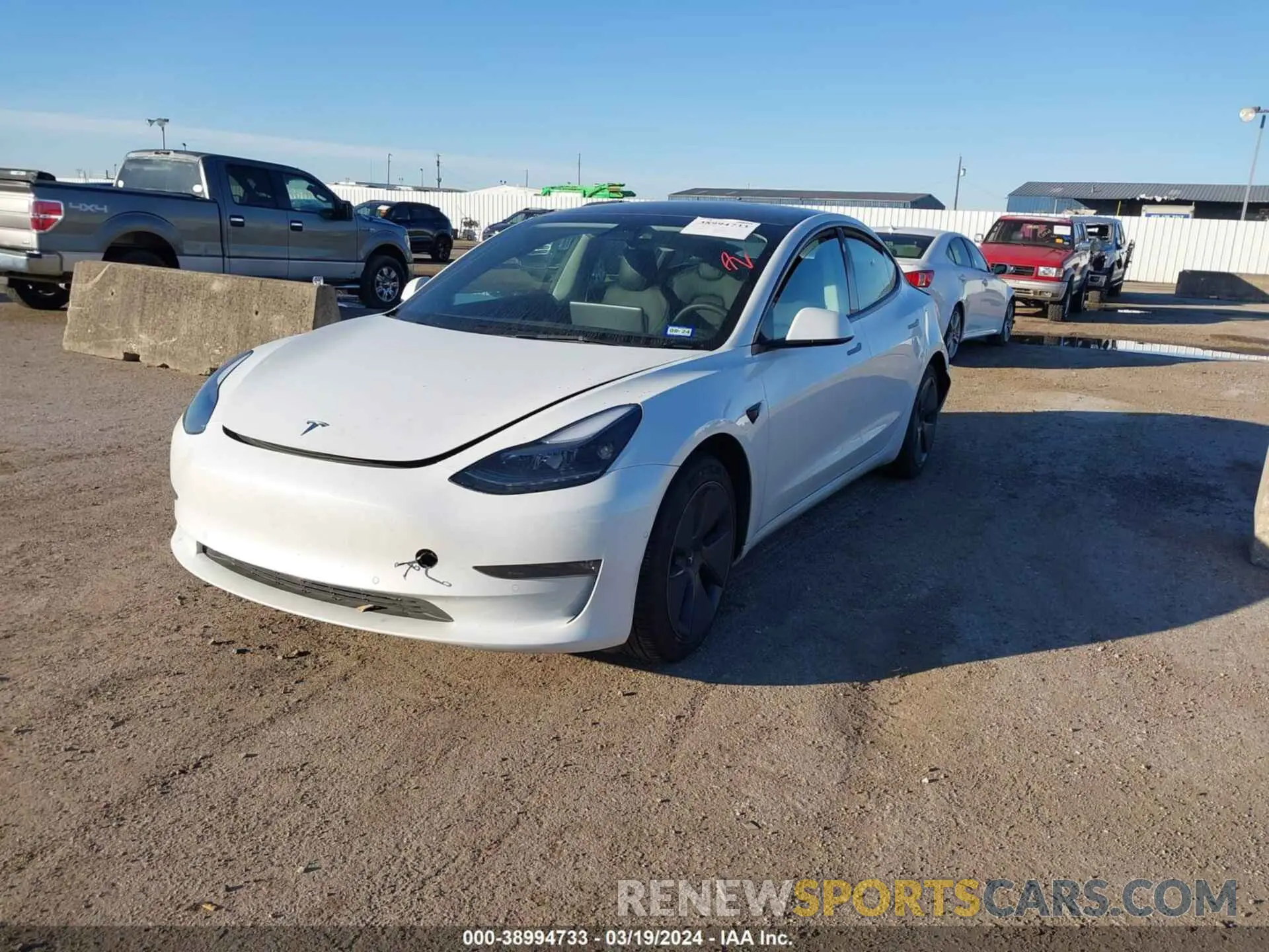 2 fotografías del automóvil dañado 5YJ3E1EB4NF334586 TESLA MODEL 3 2022