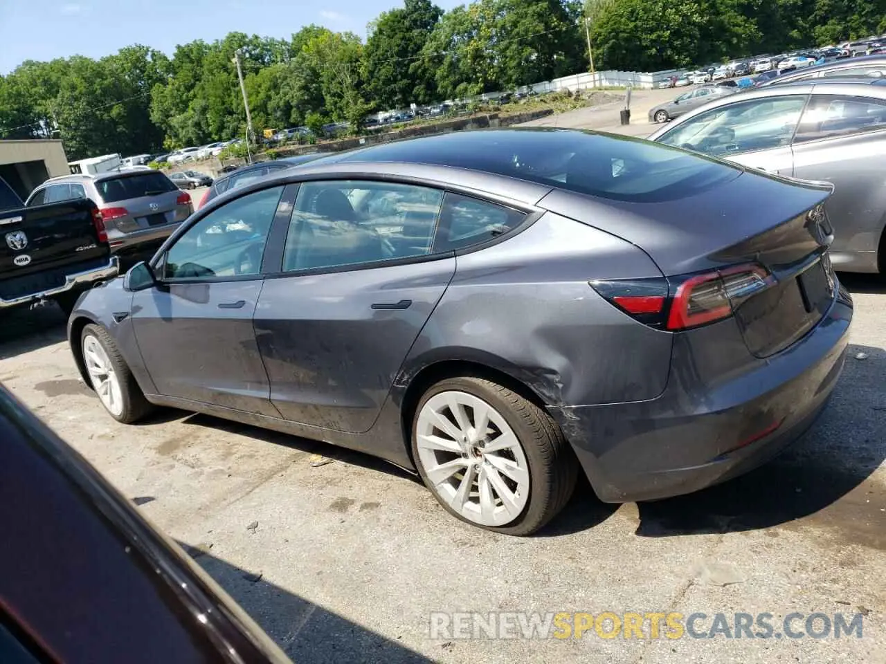 2 fotografías del automóvil dañado 5YJ3E1EB5NF105785 TESLA MODEL 3 2022