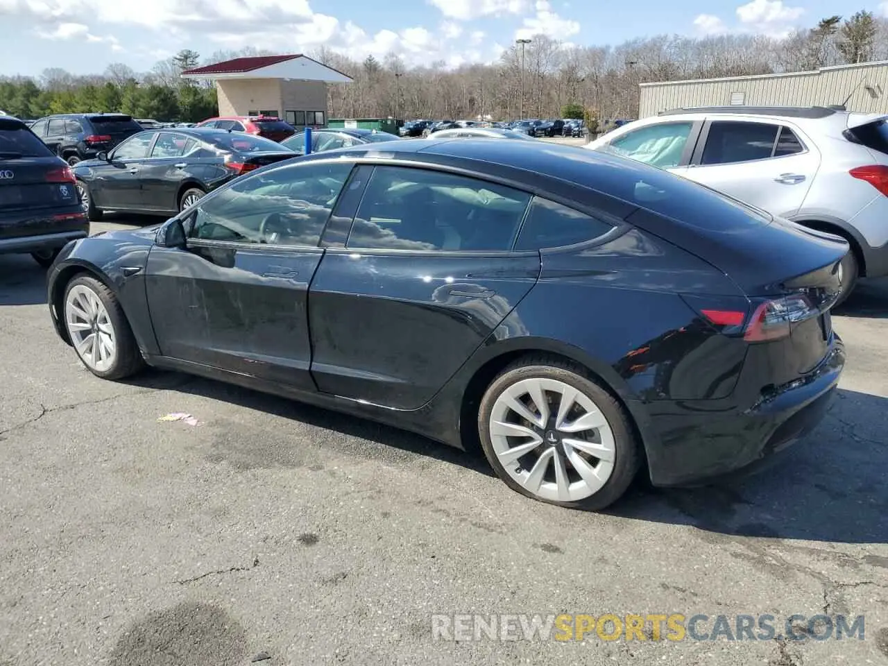 2 fotografías del automóvil dañado 5YJ3E1EB5NF118892 TESLA MODEL 3 2022