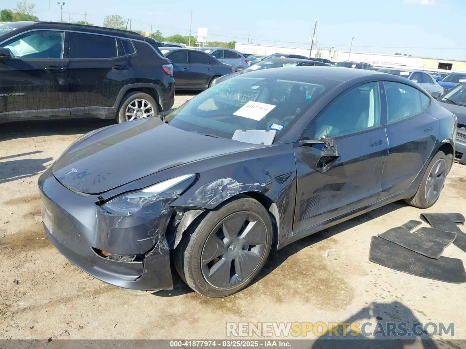 2 fotografías del automóvil dañado 5YJ3E1EB5NF124286 TESLA MODEL 3 2022