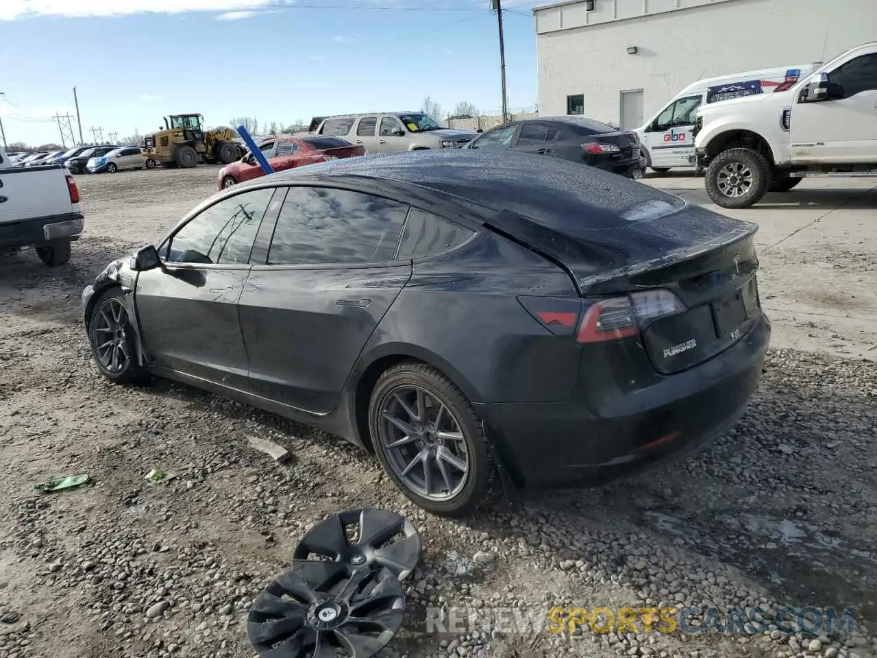 2 fotografías del automóvil dañado 5YJ3E1EB5NF125535 TESLA MODEL 3 2022