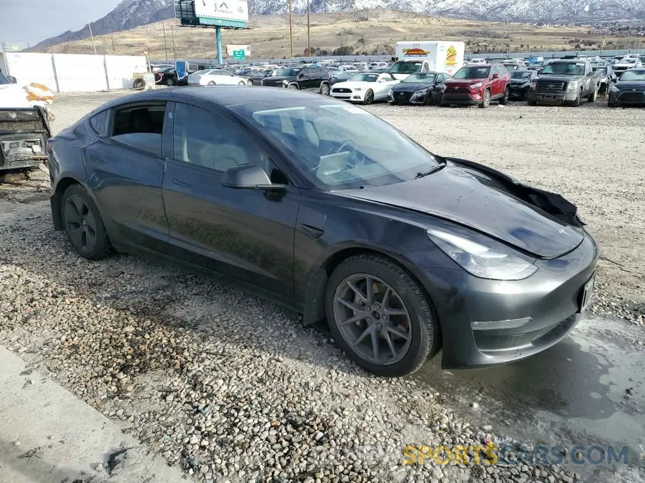 4 fotografías del automóvil dañado 5YJ3E1EB5NF125535 TESLA MODEL 3 2022