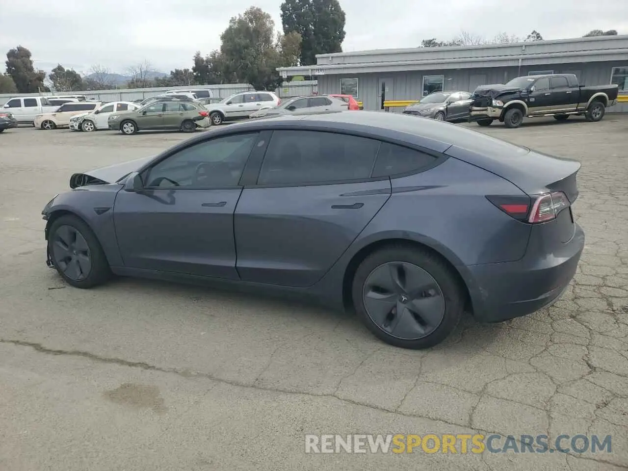2 fotografías del automóvil dañado 5YJ3E1EB5NF135577 TESLA MODEL 3 2022