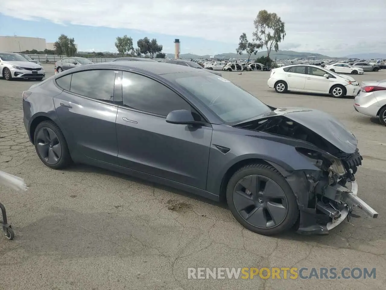 4 fotografías del automóvil dañado 5YJ3E1EB5NF135577 TESLA MODEL 3 2022