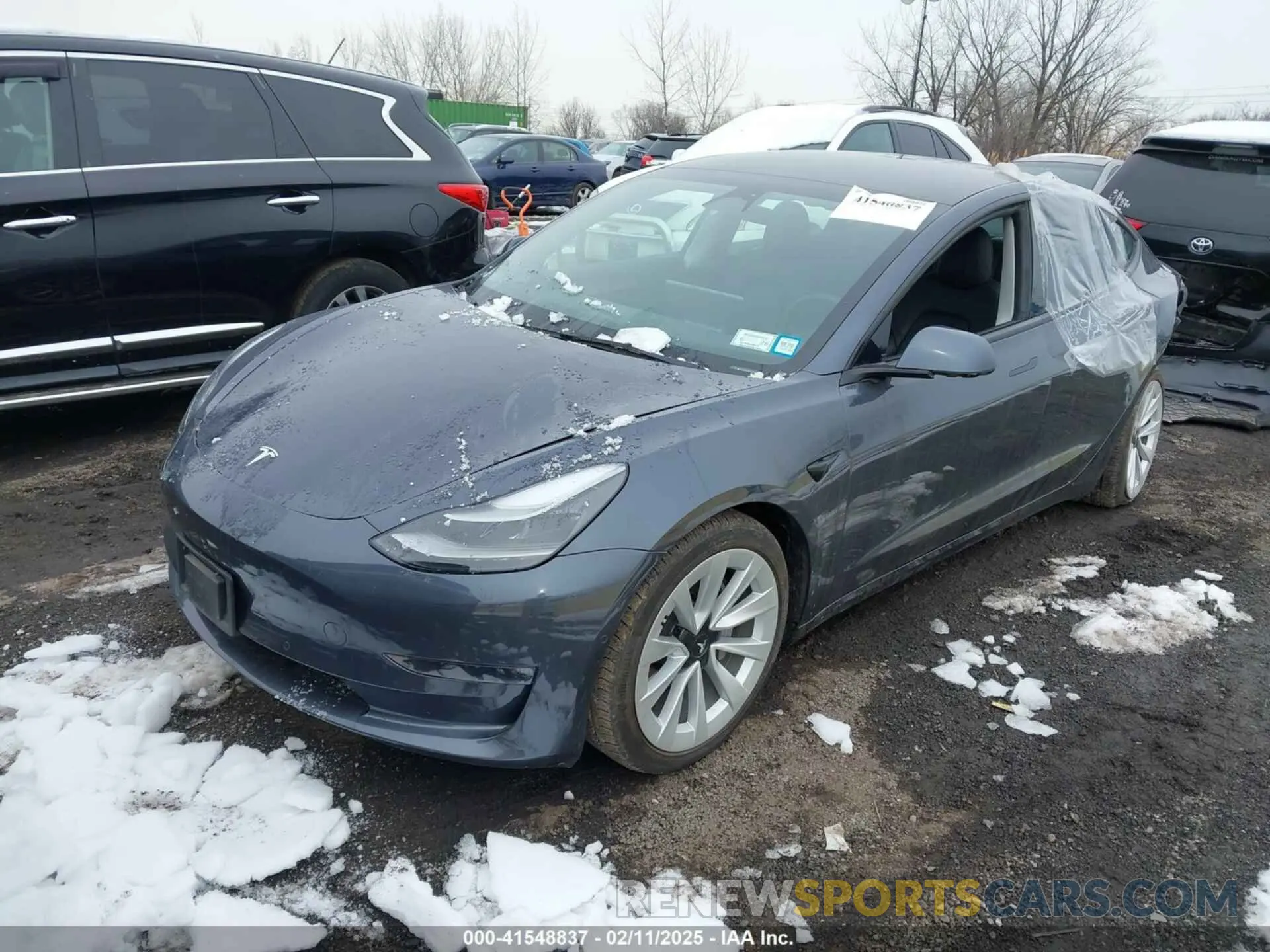 2 fotografías del automóvil dañado 5YJ3E1EB5NF271658 TESLA MODEL 3 2022