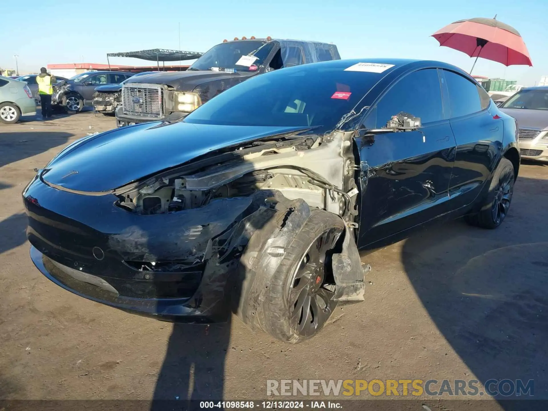 2 fotografías del automóvil dañado 5YJ3E1EB5NF313360 TESLA MODEL 3 2022