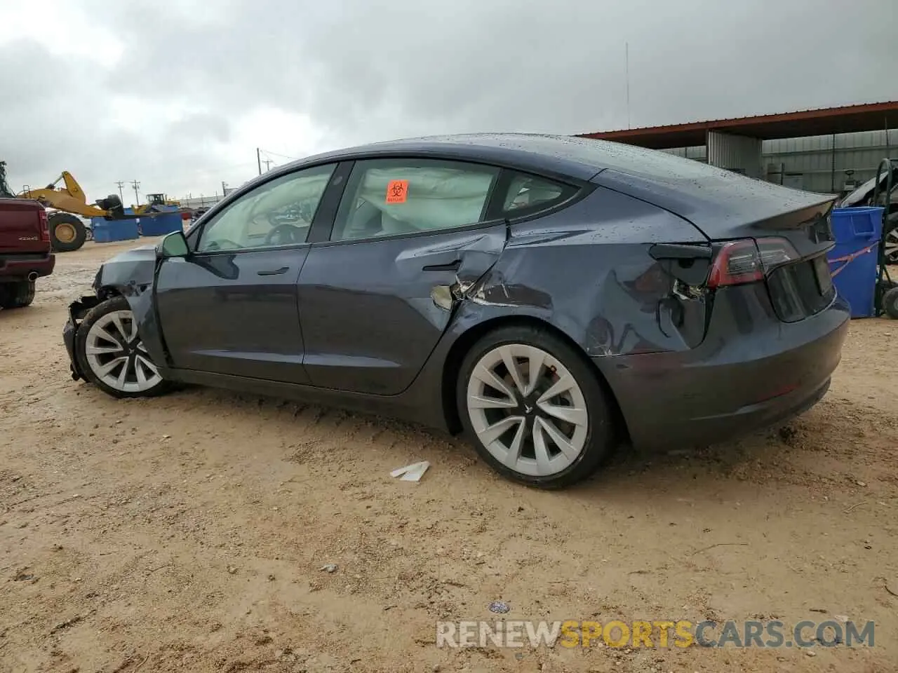 2 fotografías del automóvil dañado 5YJ3E1EB5NF330658 TESLA MODEL 3 2022