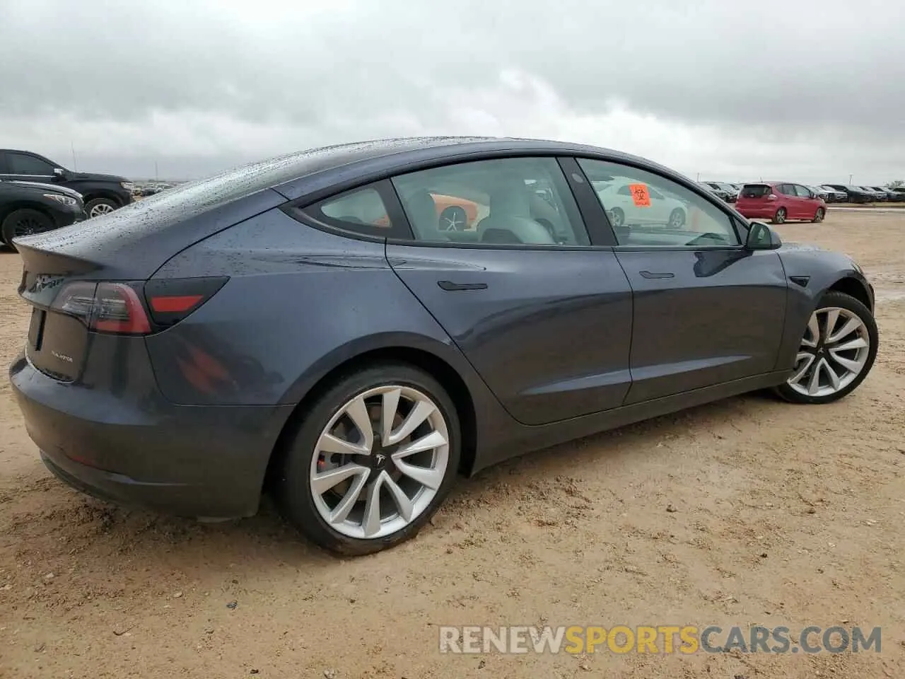 3 fotografías del automóvil dañado 5YJ3E1EB5NF330658 TESLA MODEL 3 2022