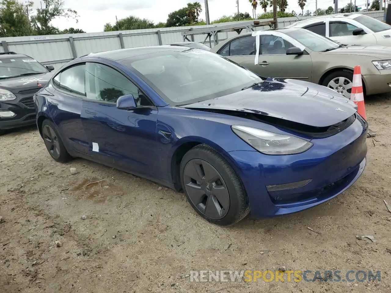 4 fotografías del automóvil dañado 5YJ3E1EB5NF334399 TESLA MODEL 3 2022