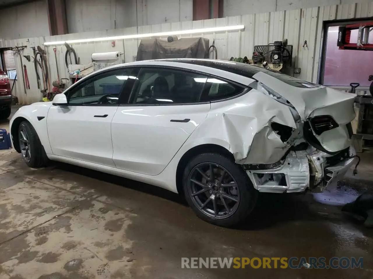 2 fotografías del automóvil dañado 5YJ3E1EB5NF334516 TESLA MODEL 3 2022