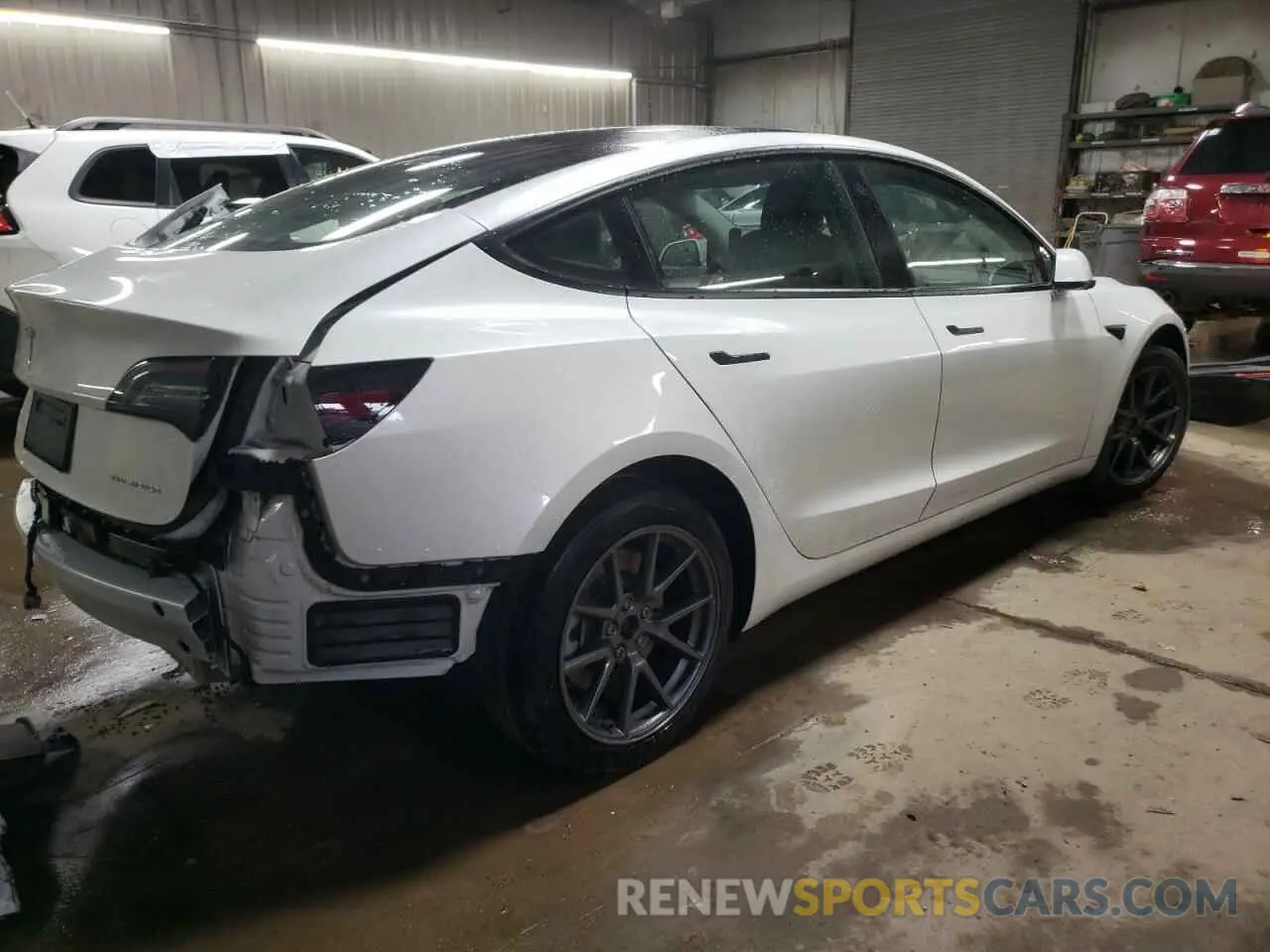 3 fotografías del automóvil dañado 5YJ3E1EB5NF334516 TESLA MODEL 3 2022