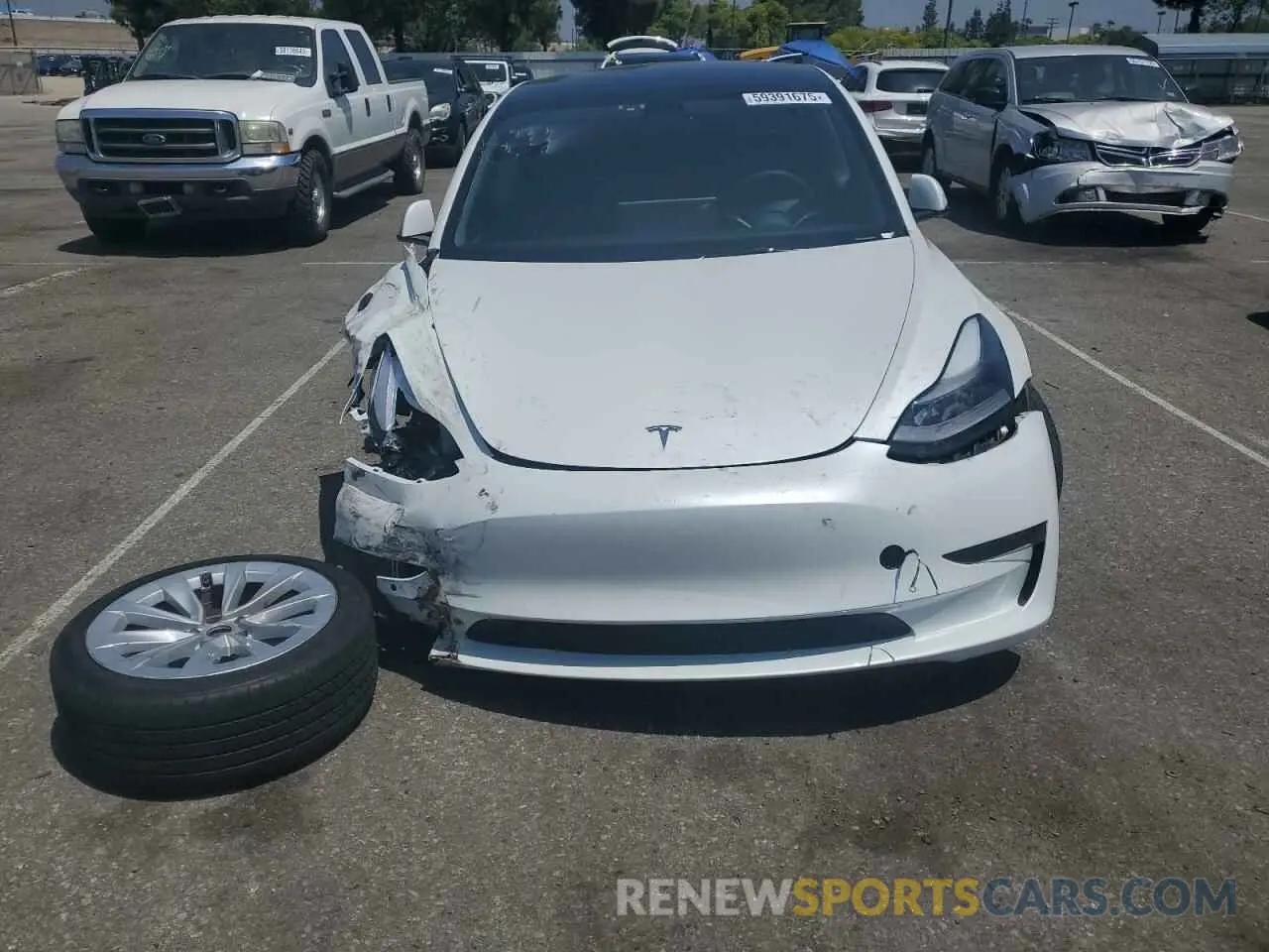 5 fotografías del automóvil dañado 5YJ3E1EB6NF127326 TESLA MODEL 3 2022