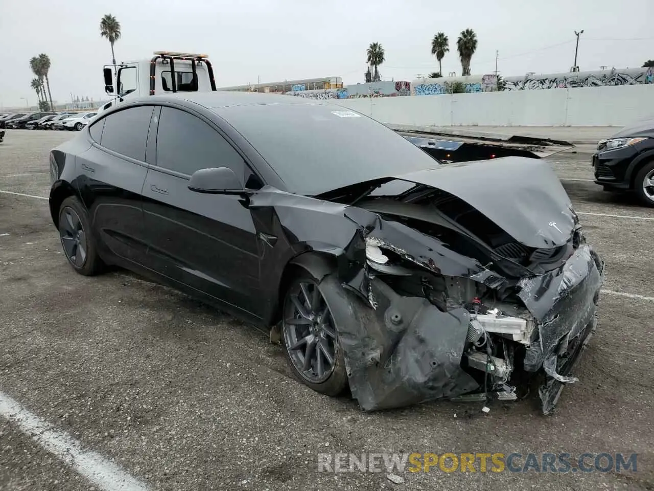 4 fotografías del automóvil dañado 5YJ3E1EB6NF128265 TESLA MODEL 3 2022