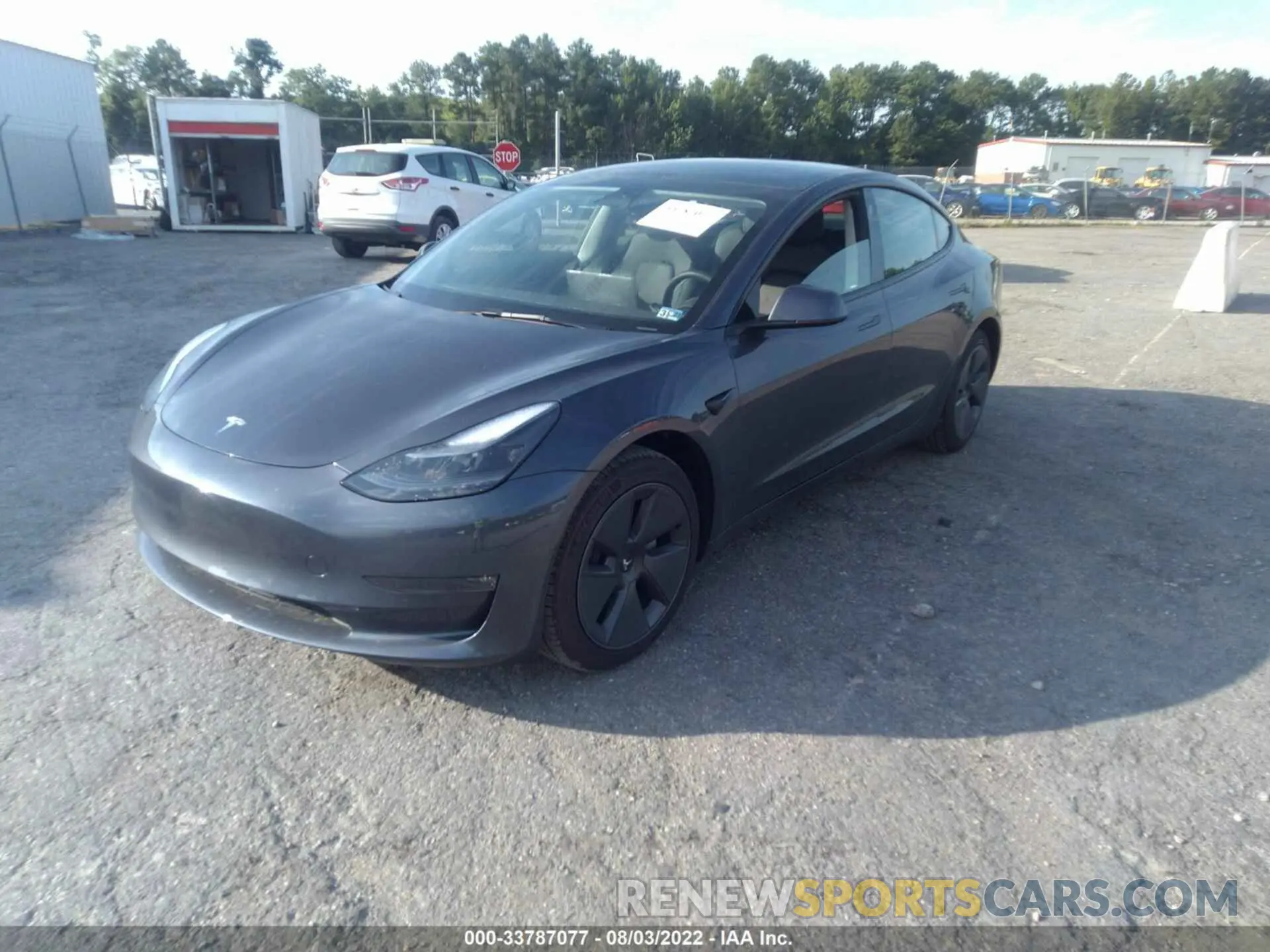 2 fotografías del automóvil dañado 5YJ3E1EB6NF180589 TESLA MODEL 3 2022