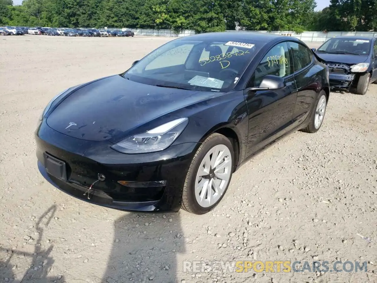 2 fotografías del automóvil dañado 5YJ3E1EB6NF189812 TESLA MODEL 3 2022