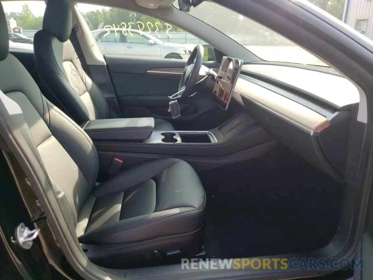 5 fotografías del automóvil dañado 5YJ3E1EB6NF189812 TESLA MODEL 3 2022