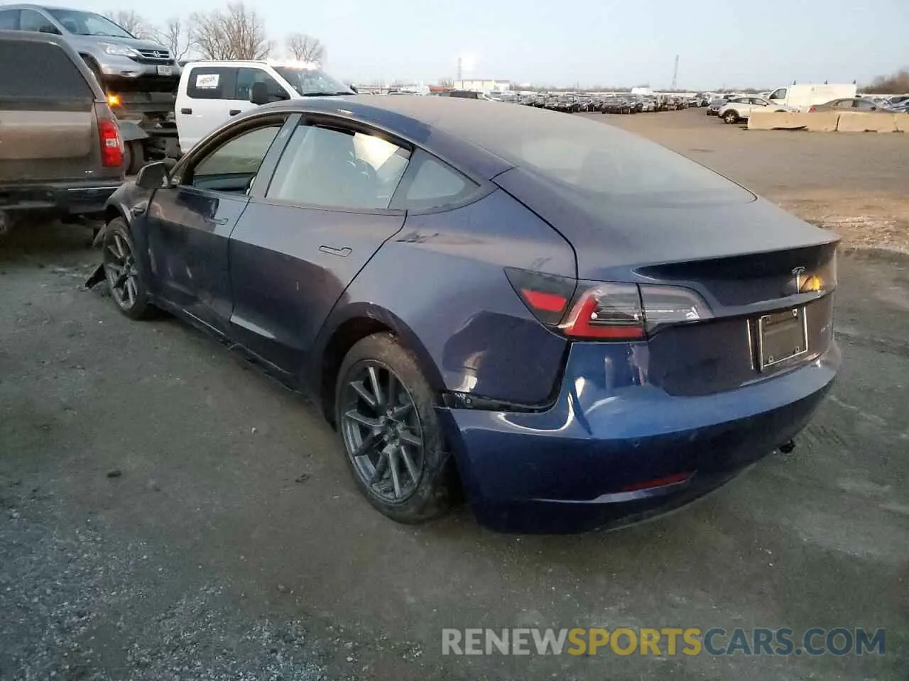 2 fotografías del automóvil dañado 5YJ3E1EB6NF192192 TESLA MODEL 3 2022