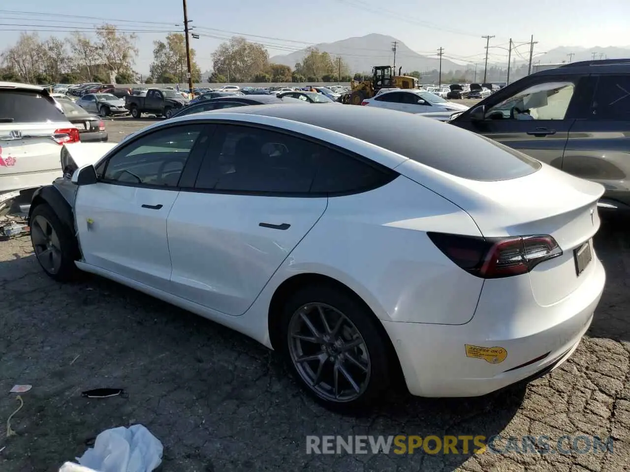 2 fotografías del automóvil dañado 5YJ3E1EB6NF207936 TESLA MODEL 3 2022