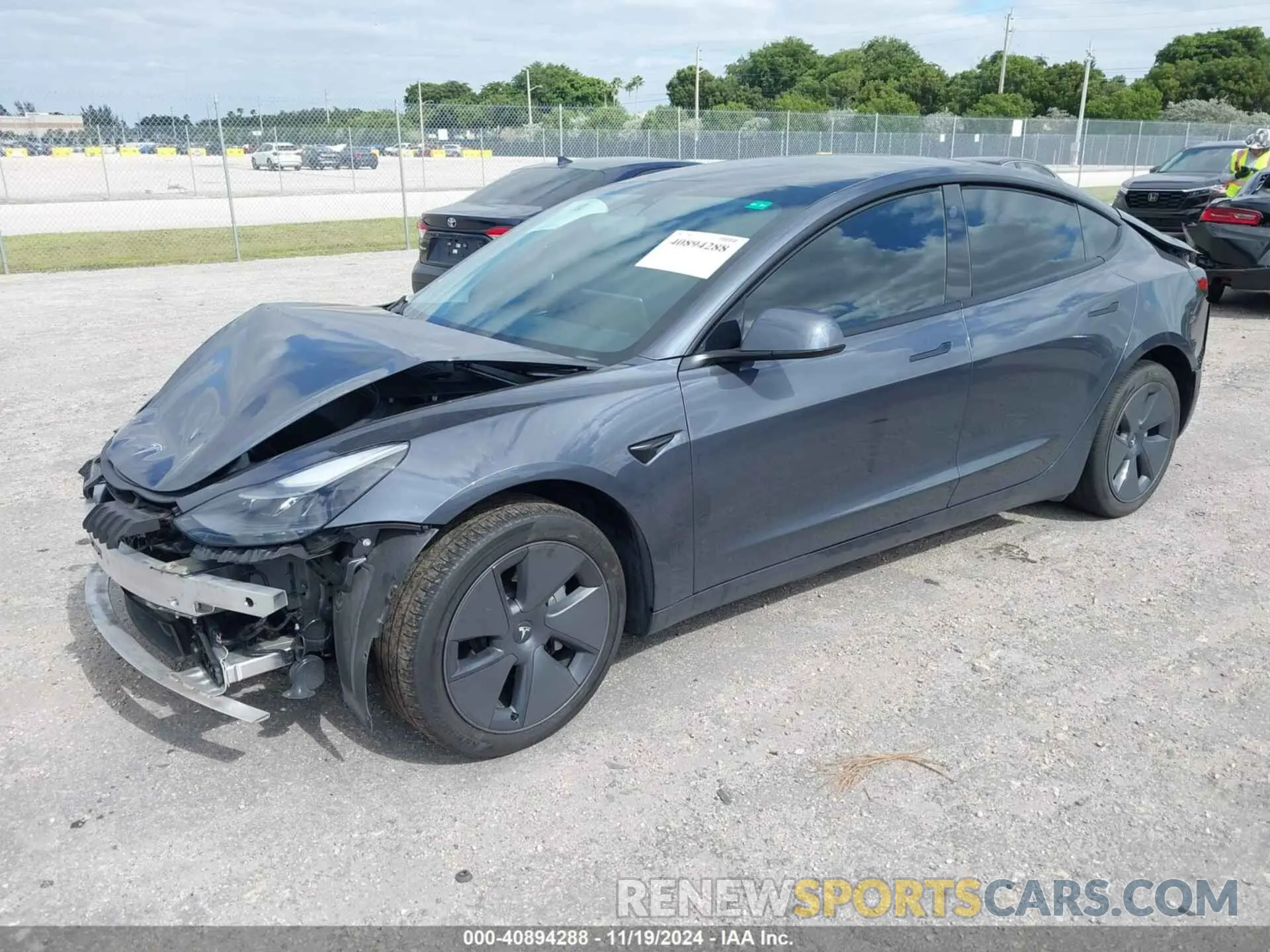 2 fotografías del automóvil dañado 5YJ3E1EB6NF264489 TESLA MODEL 3 2022