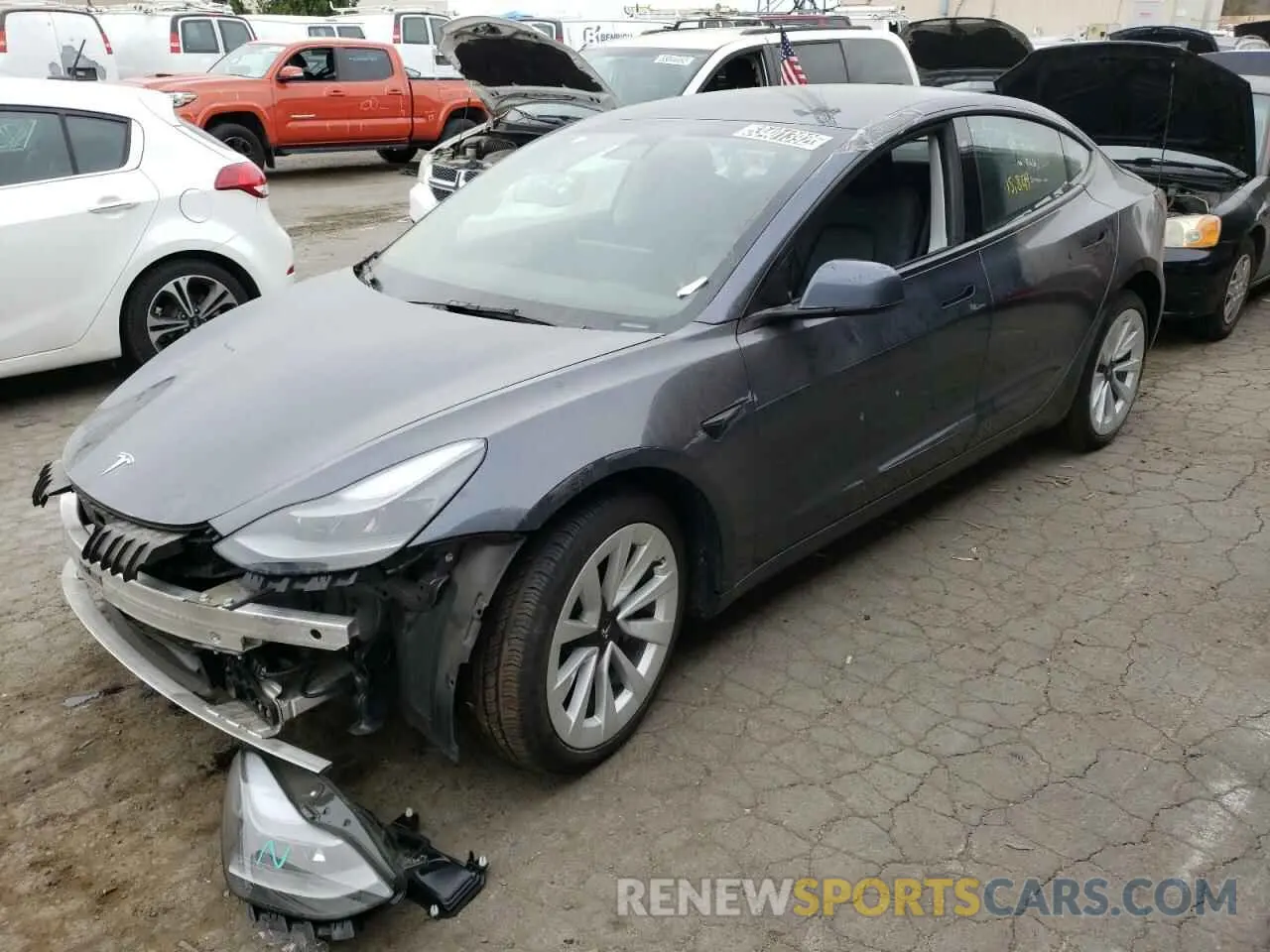 2 fotografías del automóvil dañado 5YJ3E1EB7NF145754 TESLA MODEL 3 2022
