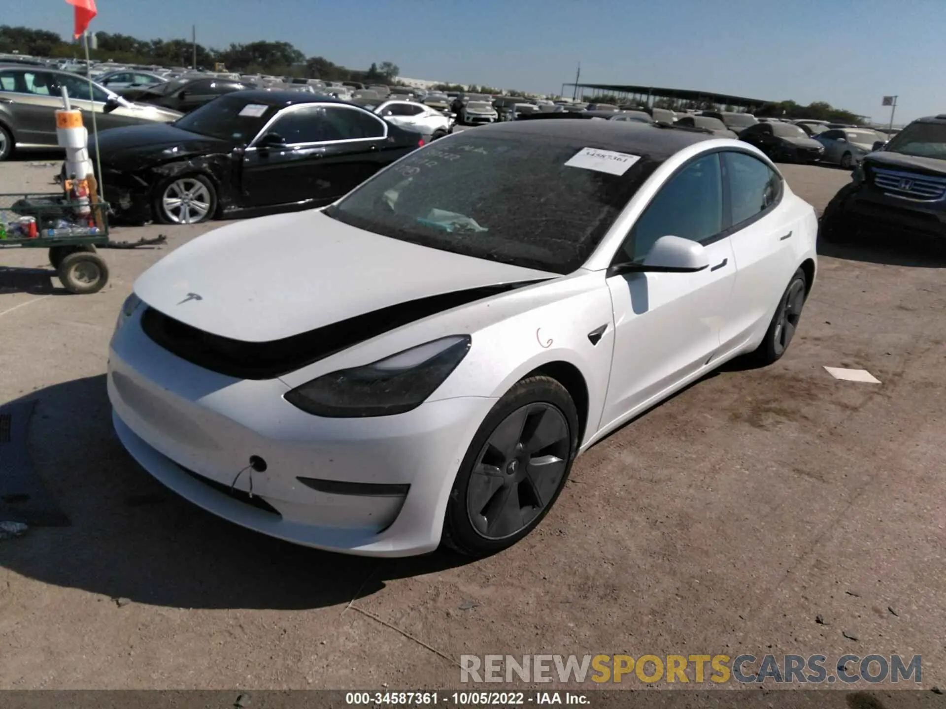 2 fotografías del automóvil dañado 5YJ3E1EB7NF172498 TESLA MODEL 3 2022