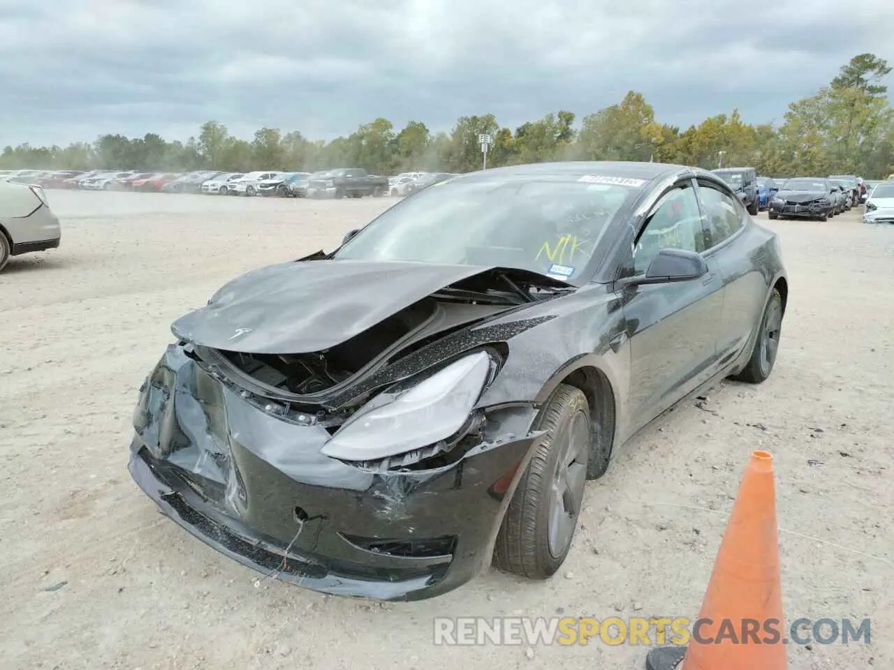 2 fotografías del automóvil dañado 5YJ3E1EB7NF190998 TESLA MODEL 3 2022