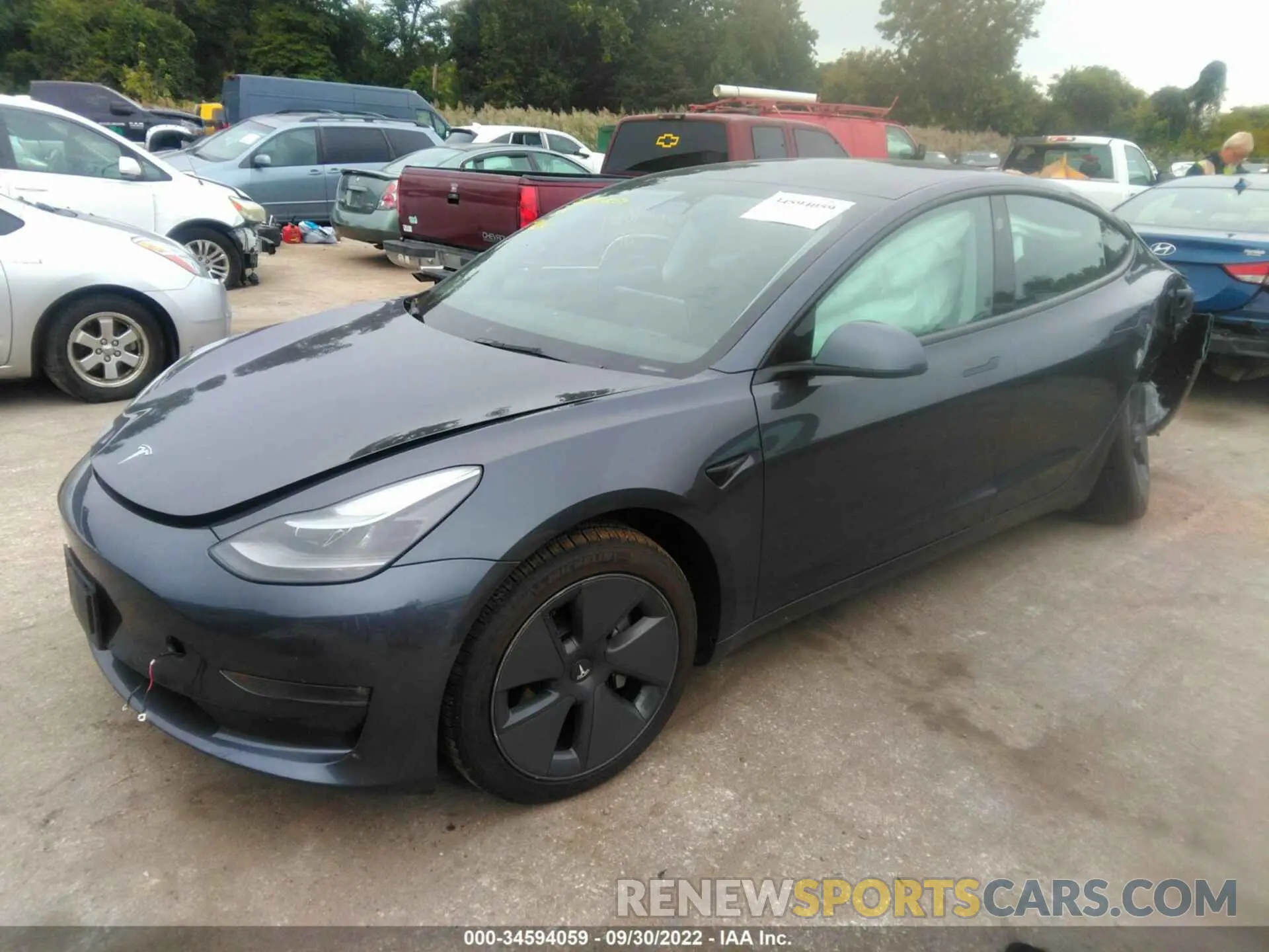 2 fotografías del automóvil dañado 5YJ3E1EB8NF164474 TESLA MODEL 3 2022