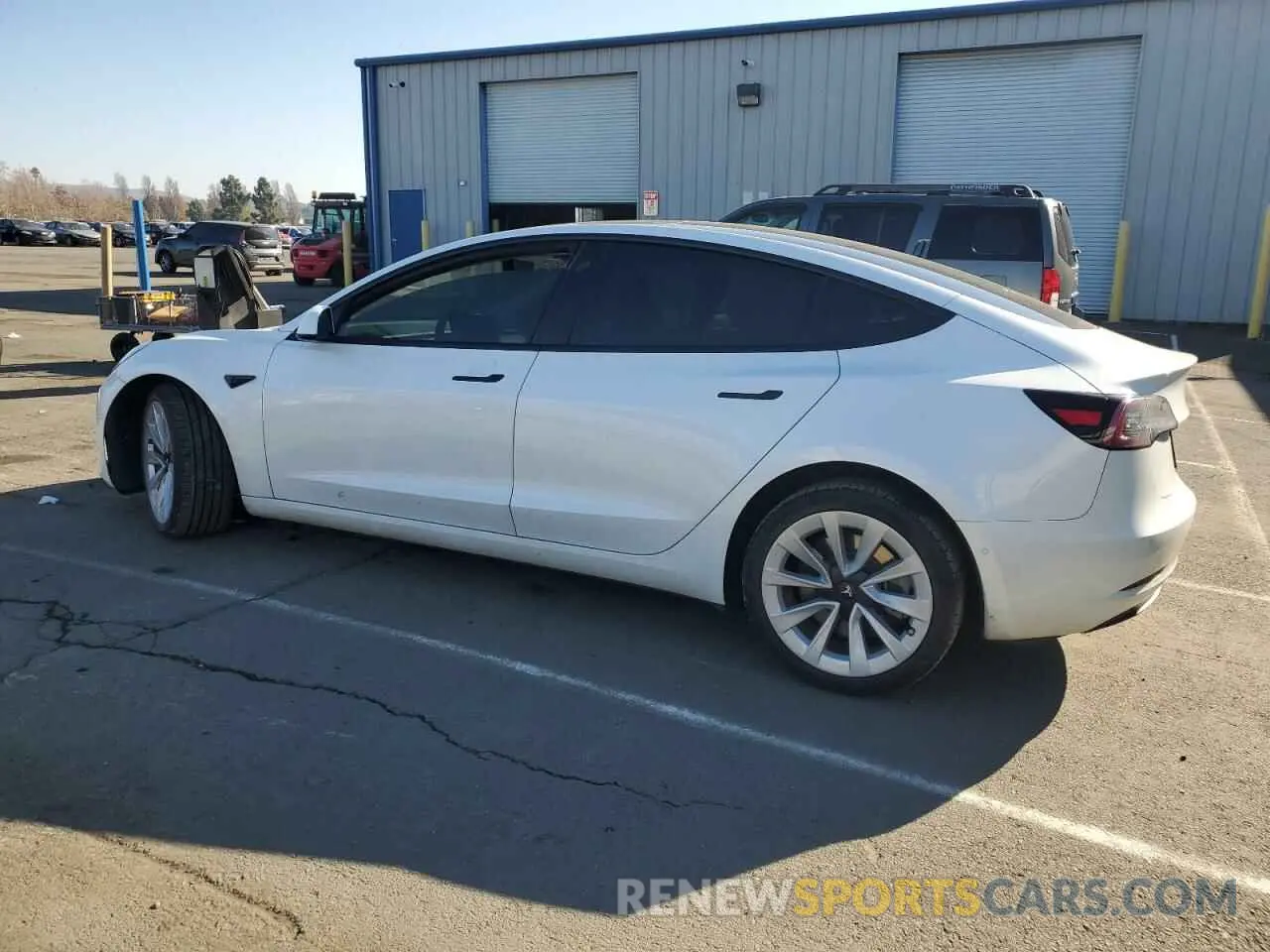 2 fotografías del automóvil dañado 5YJ3E1EB8NF166211 TESLA MODEL 3 2022