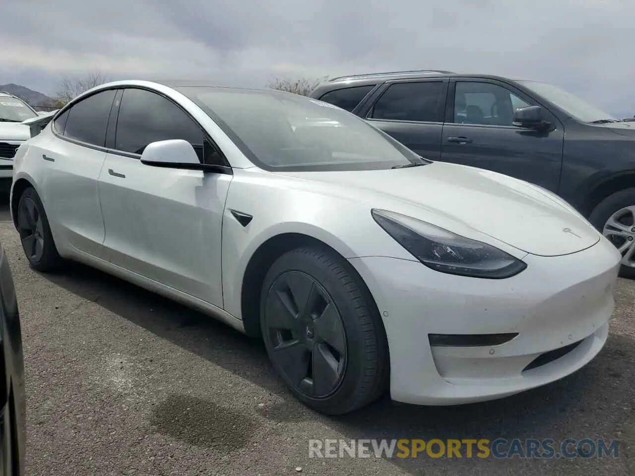 4 fotografías del automóvil dañado 5YJ3E1EB8NF169819 TESLA MODEL 3 2022