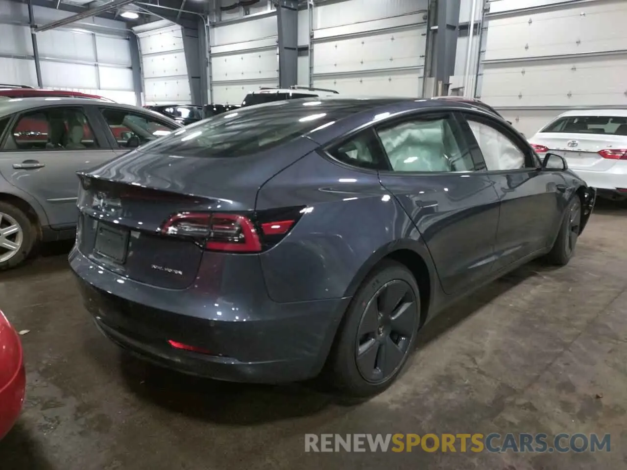 4 fotografías del automóvil dañado 5YJ3E1EB8NF185468 TESLA MODEL 3 2022