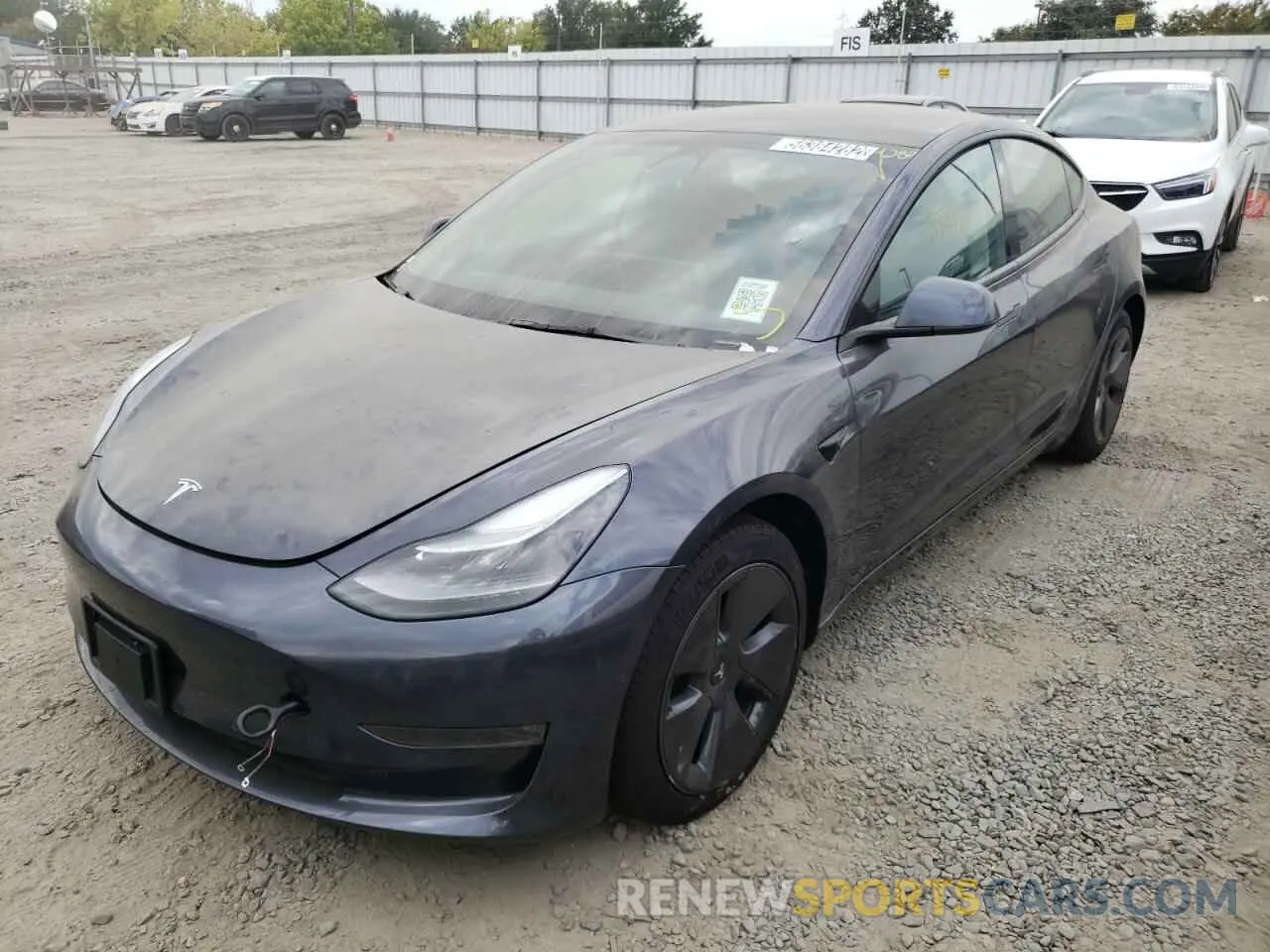2 fotografías del automóvil dañado 5YJ3E1EB8NF188497 TESLA MODEL 3 2022