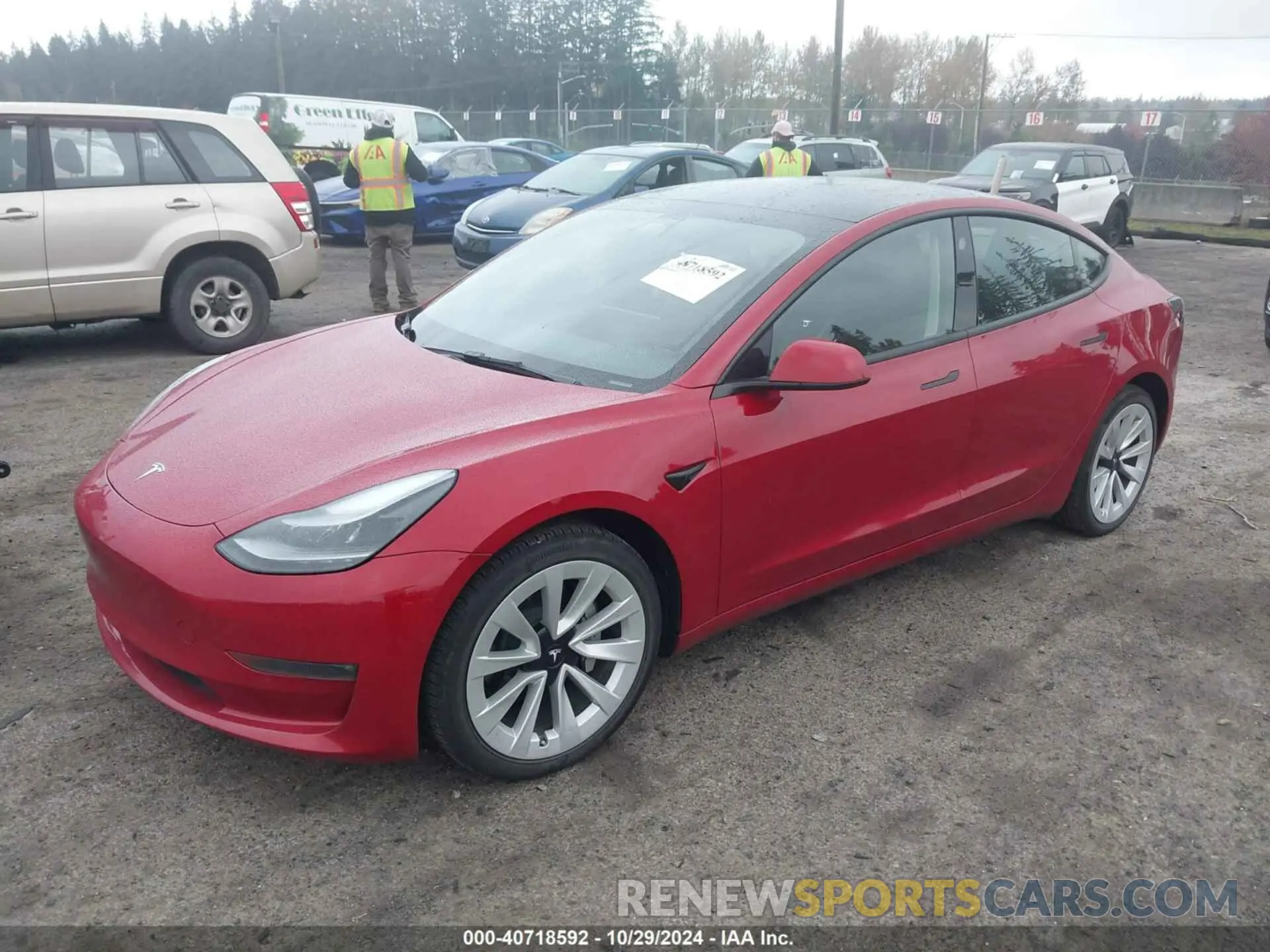 2 fotografías del automóvil dañado 5YJ3E1EB8NF273081 TESLA MODEL 3 2022