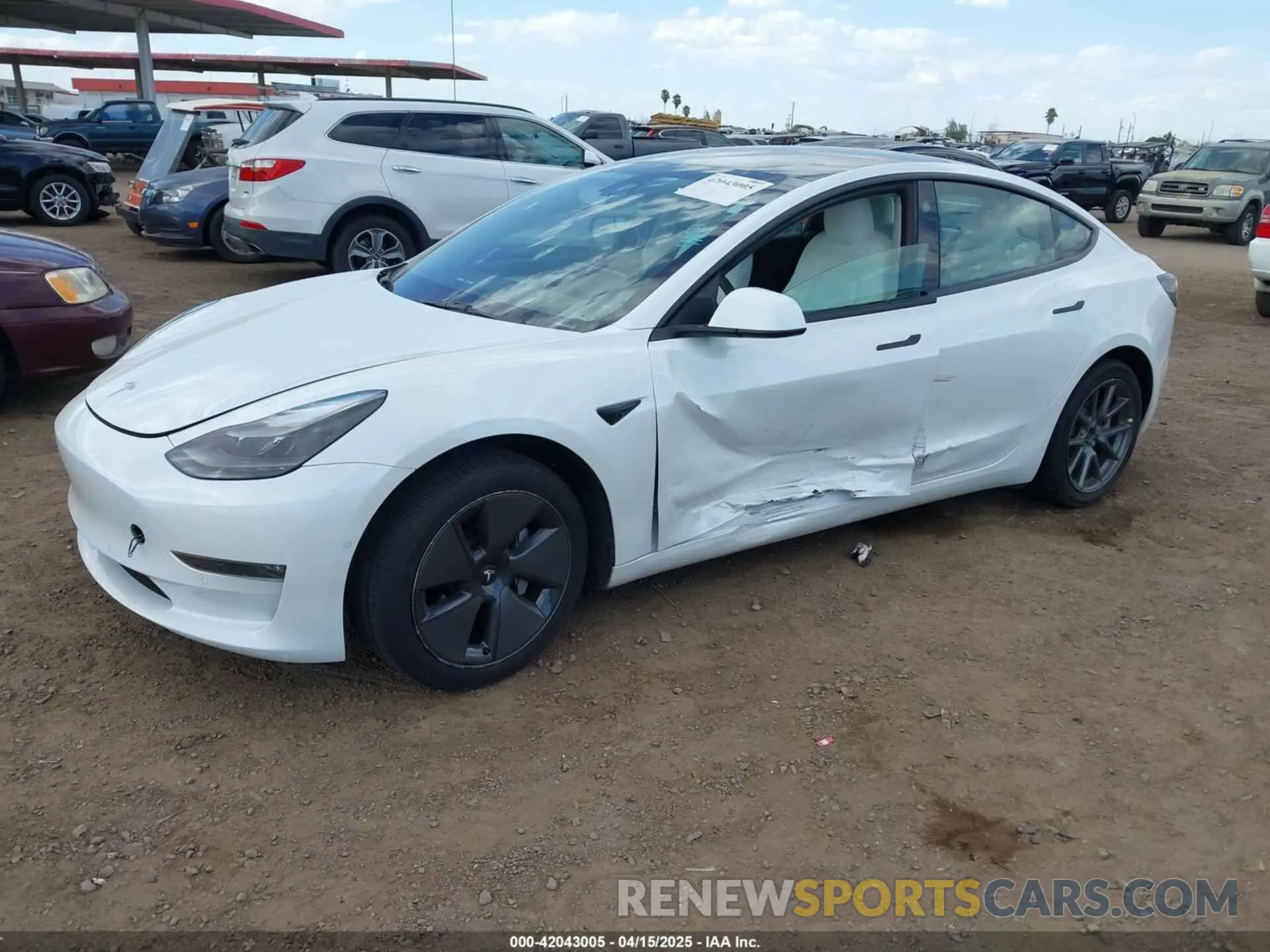 2 fotografías del automóvil dañado 5YJ3E1EB8NF338947 TESLA MODEL 3 2022
