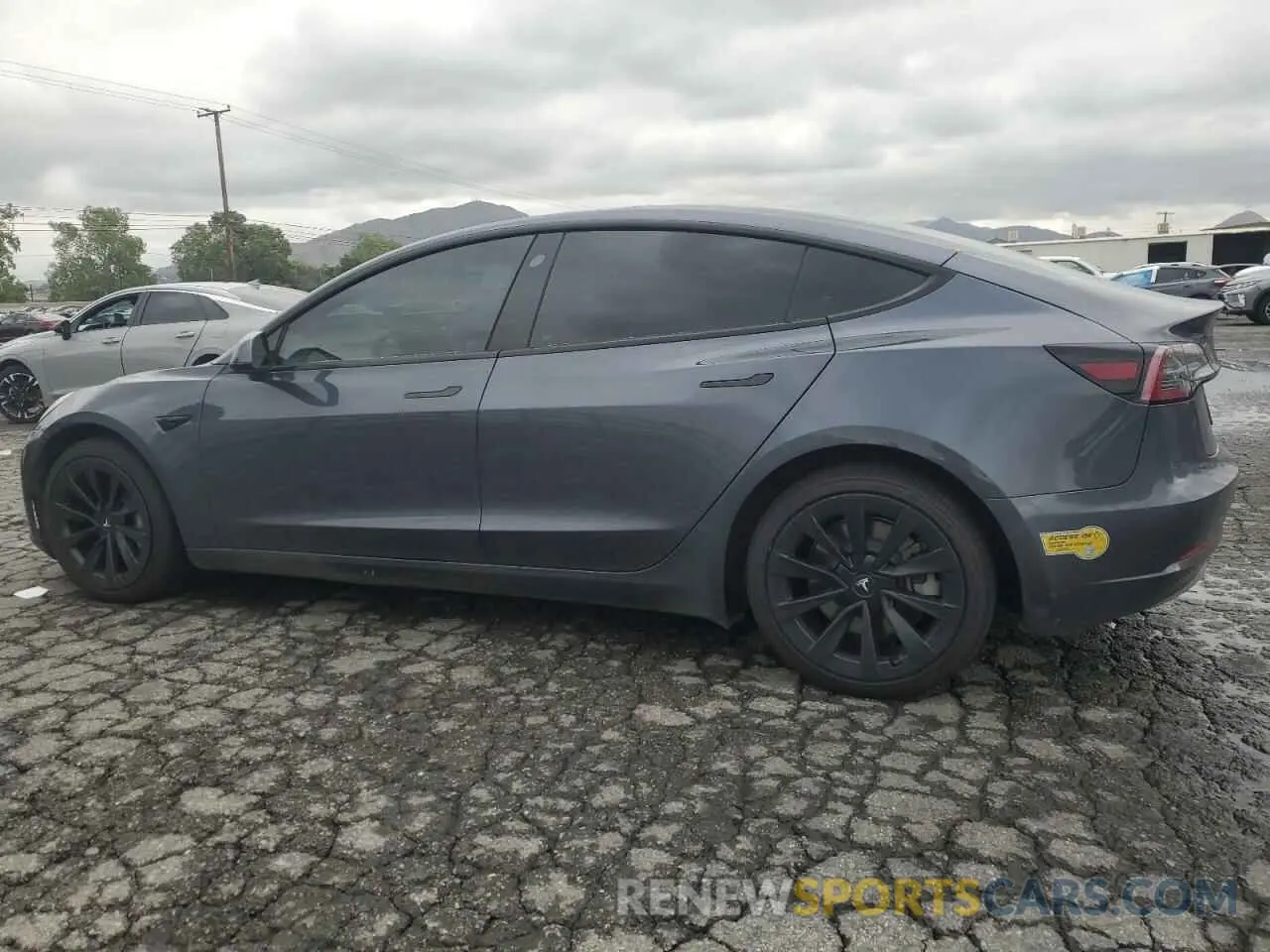 2 fotografías del automóvil dañado 5YJ3E1EB9NF117339 TESLA MODEL 3 2022