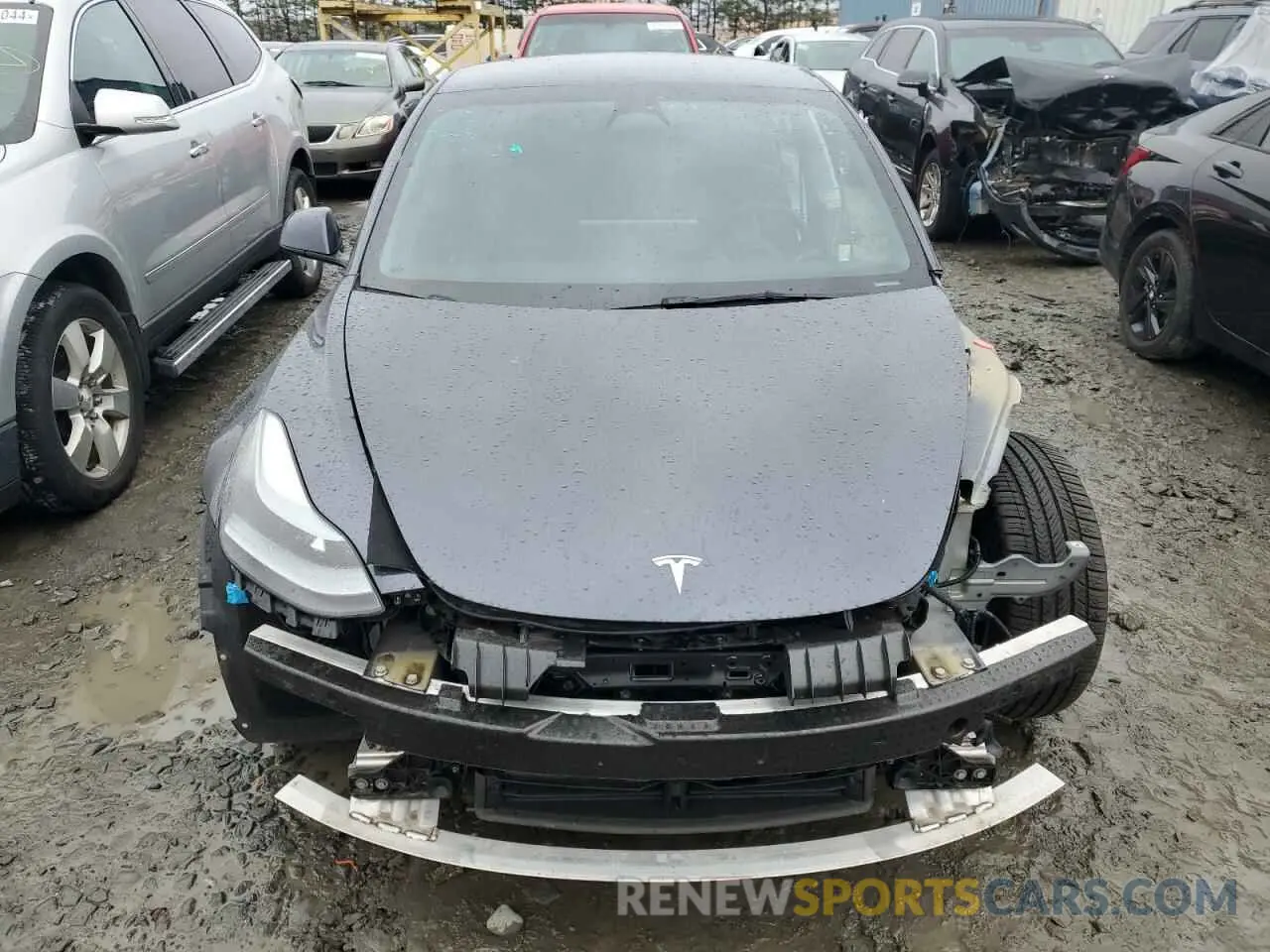 5 fotografías del automóvil dañado 5YJ3E1EB9NF166797 TESLA MODEL 3 2022