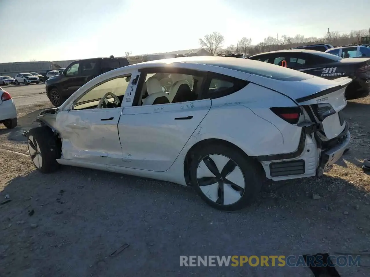 2 fotografías del automóvil dañado 5YJ3E1EB9NF169974 TESLA MODEL 3 2022