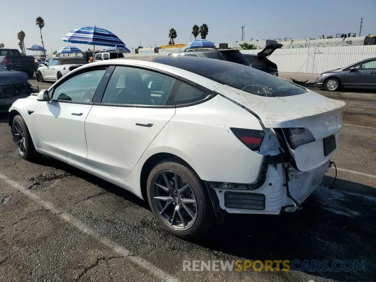 2 fotografías del automóvil dañado 5YJ3E1EB9NF173779 TESLA MODEL 3 2022