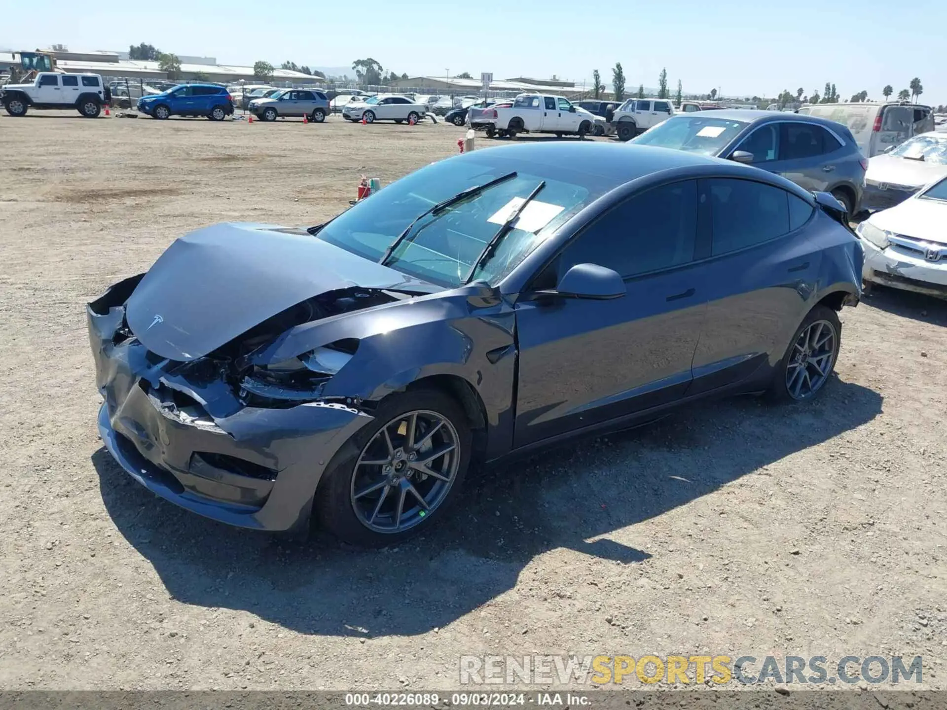 2 fotografías del automóvil dañado 5YJ3E1EB9NF184247 TESLA MODEL 3 2022