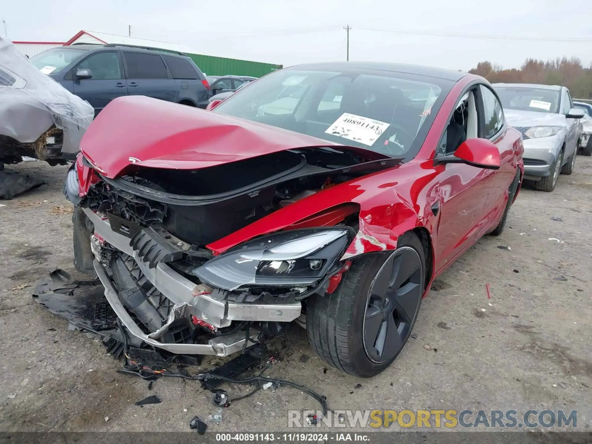 2 fotografías del automóvil dañado 5YJ3E1EB9NF227274 TESLA MODEL 3 2022