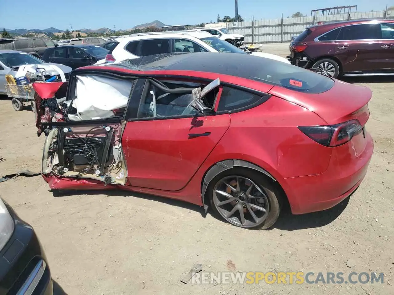 2 fotografías del automóvil dañado 5YJ3E1EB9NF357314 TESLA MODEL 3 2022