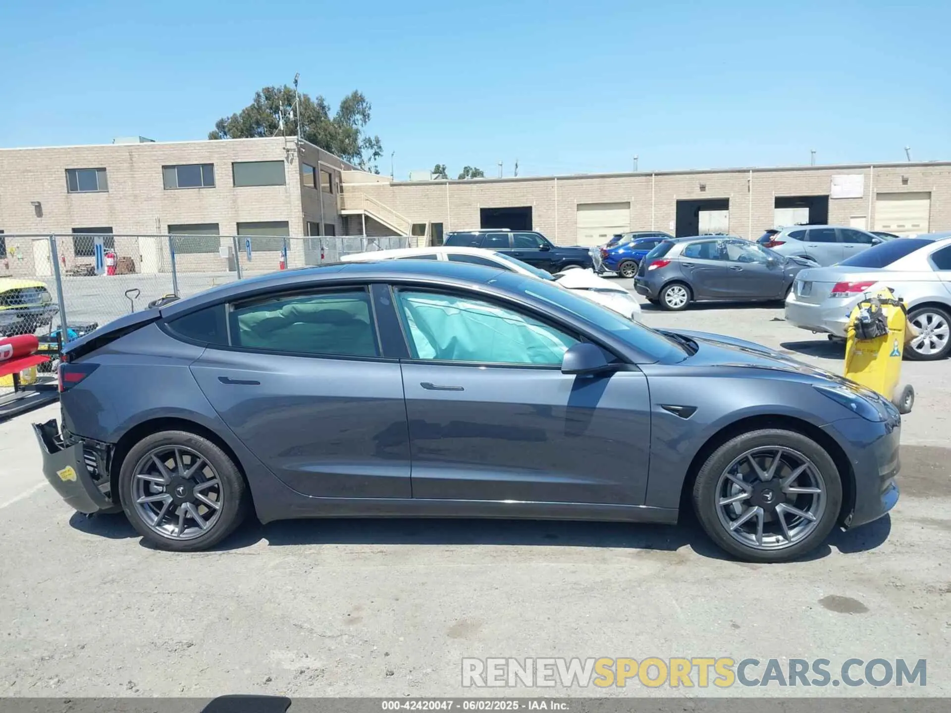12 fotografías del automóvil dañado 5YJ3E1EB9NF363131 TESLA MODEL 3 2022